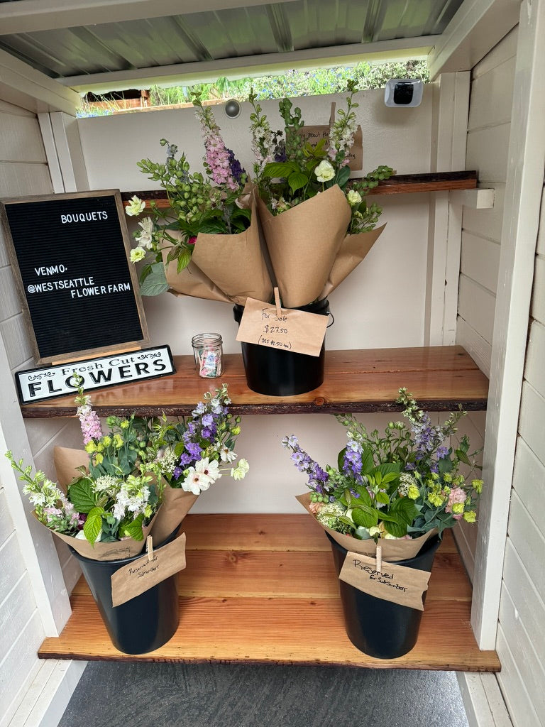 Large wrapped bouquet of Spring flowers
