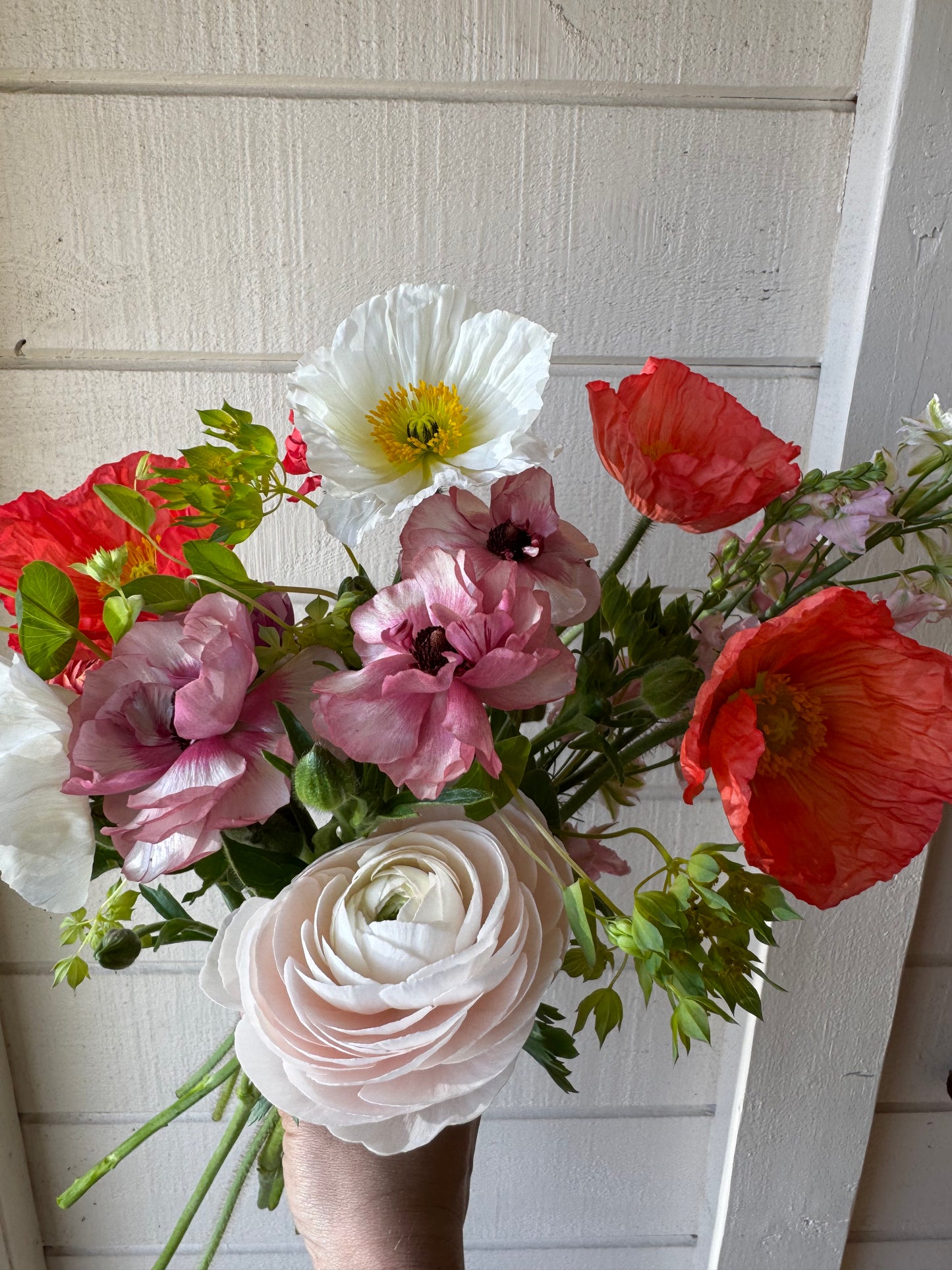 Wrapped bouquet of Spring flowers