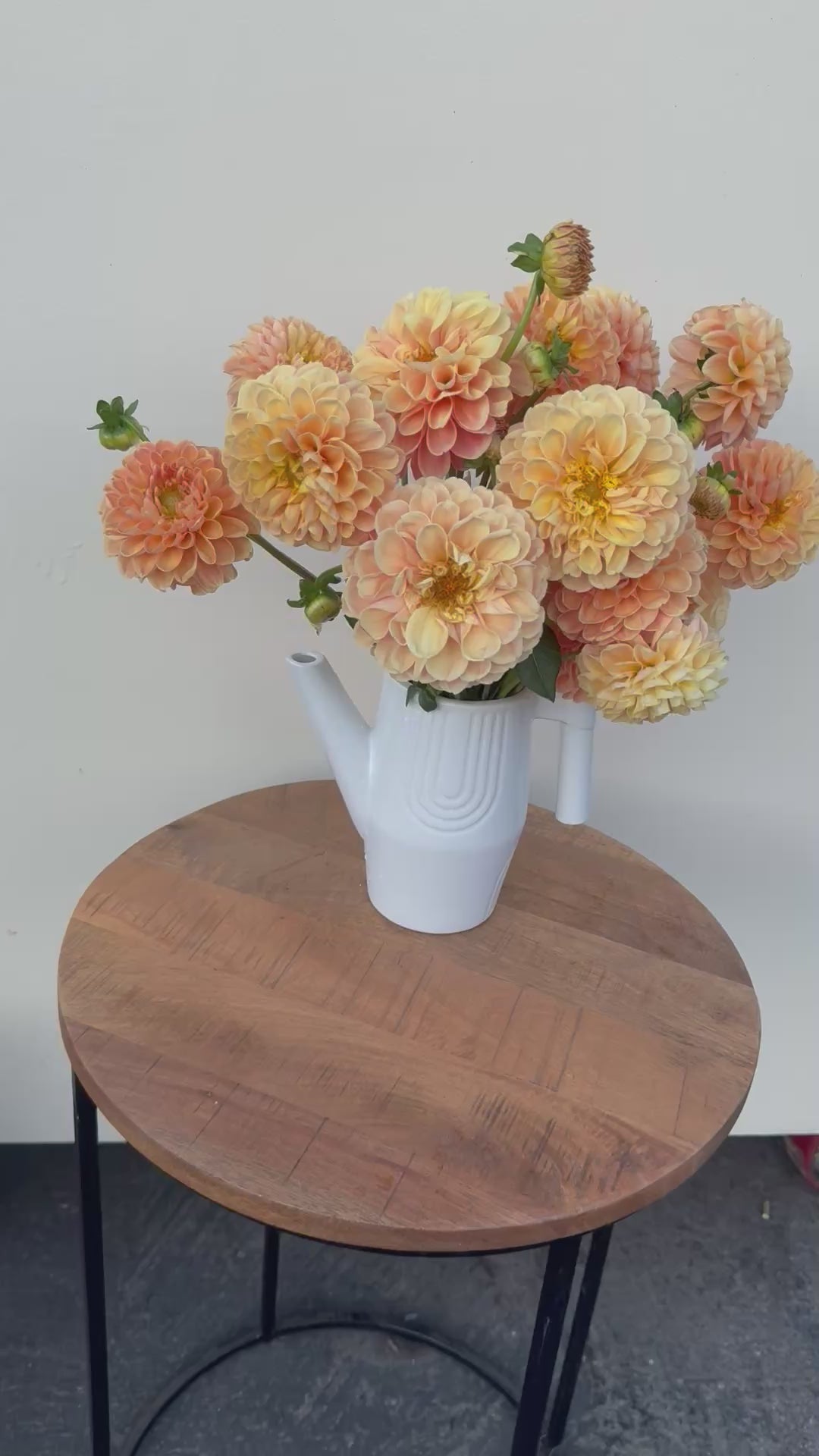 A video of a bouquet of Crichton Honey dahlias.
